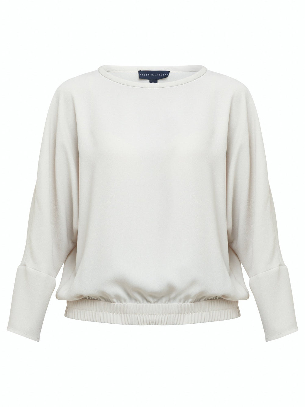 Lal, a crewneck relaxed fit sweatshirt. Crafted in a satin back crepe in rich vanilla A sporty silhouette featuring an elasticated ribbed hem, dropped shoulder & full-length sleeve. Teams perfectly with Charlize pants. Clothes for how we live today! Loungewear re-defined.