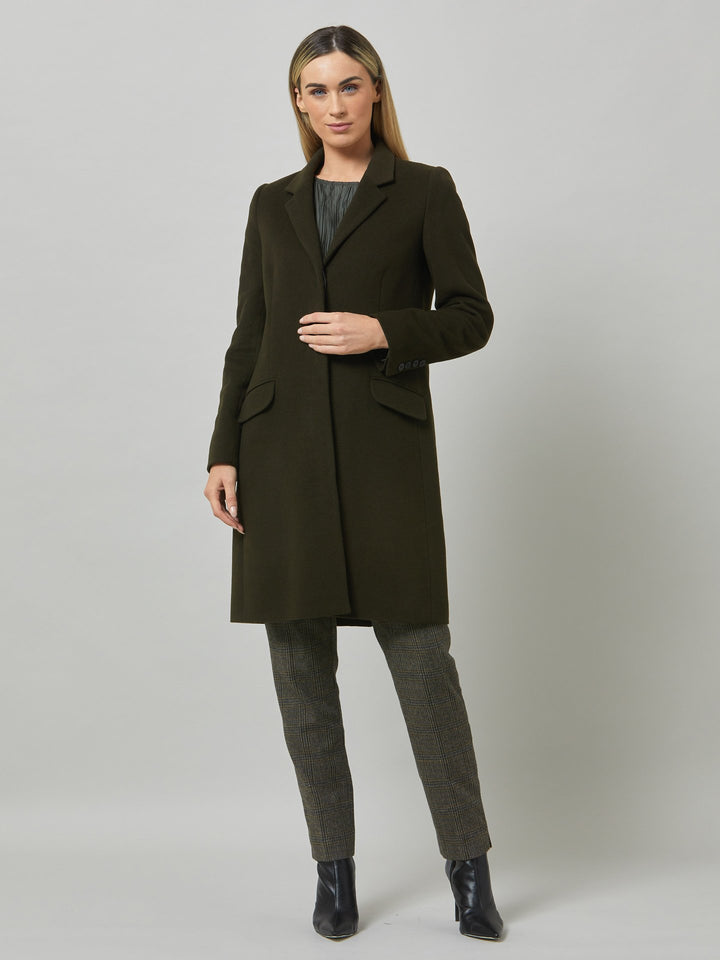 First impressions count, and that's exactly what great outerwear is. Invest in your wardrobe's hardest-working layer. Opt for the lisa coat. Our updated crombie. It's cut from a wool blend dark olive melton.. Note the tidy collar & revere inspired by mens tailloring. Features handy flap pockets & concealed buttons. This knee-length coat ensures stylish winter warmth.