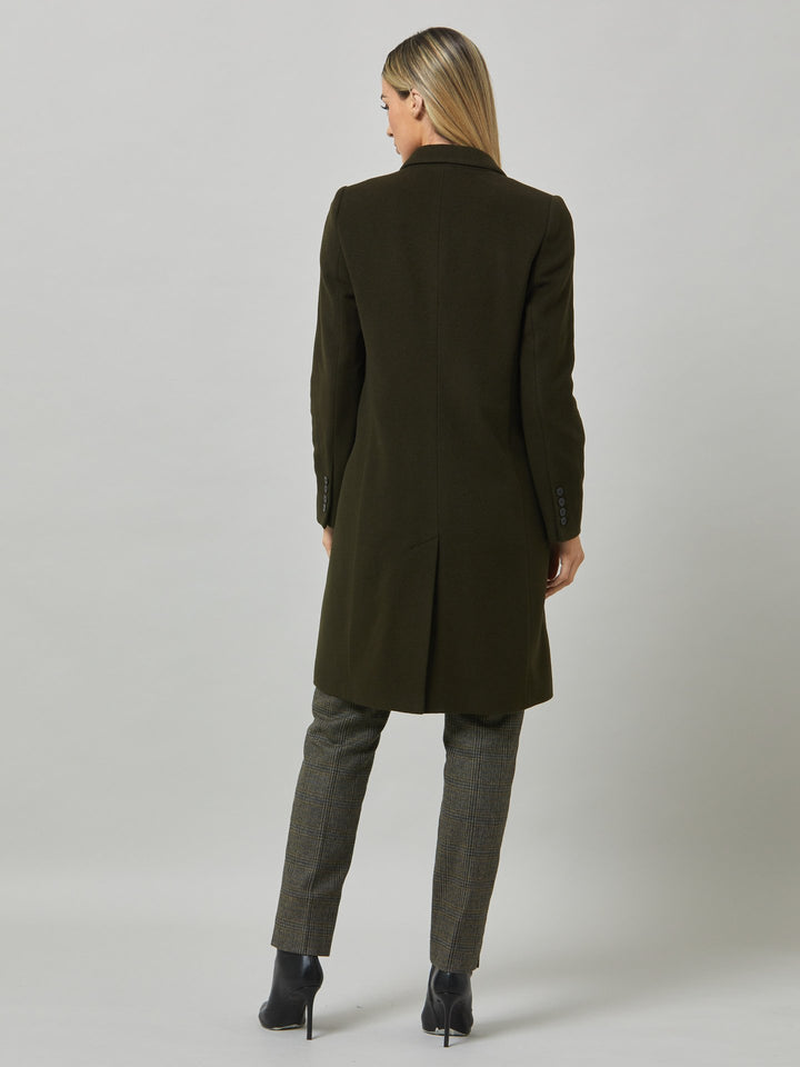 First impressions count, and that's exactly what great outerwear is. Invest in your wardrobe's hardest-working layer. Opt for the lisa coat. Our updated crombie. It's cut from a wool blend dark olive melton.. Note the tidy collar & revere inspired by mens tailloring. Features handy flap pockets & concealed buttons. This knee-length coat ensures stylish winter warmth.