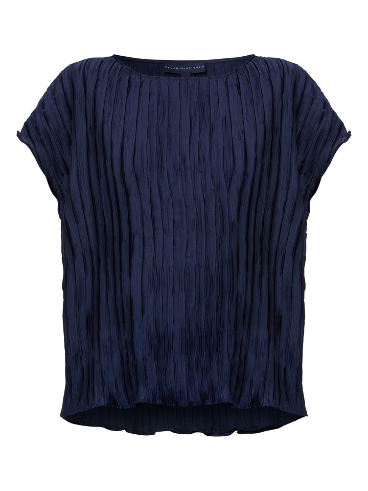 Lucy, our classic shell top is redefined in polished navy pleated fabric. A simple wardrobe essential, the perfect foil for the matching Roz navy pleated skirt.