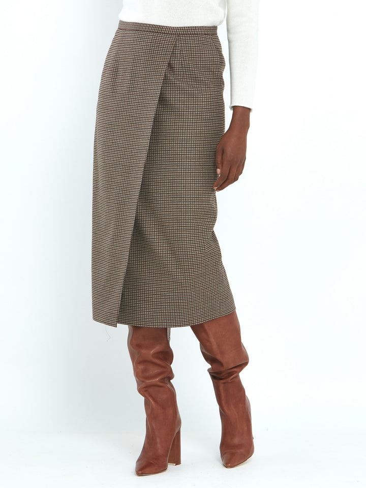A faux wrap, mid calf length pencil skirt in a soft handle micro check. Sophisticated city style with a hint of heritage. 