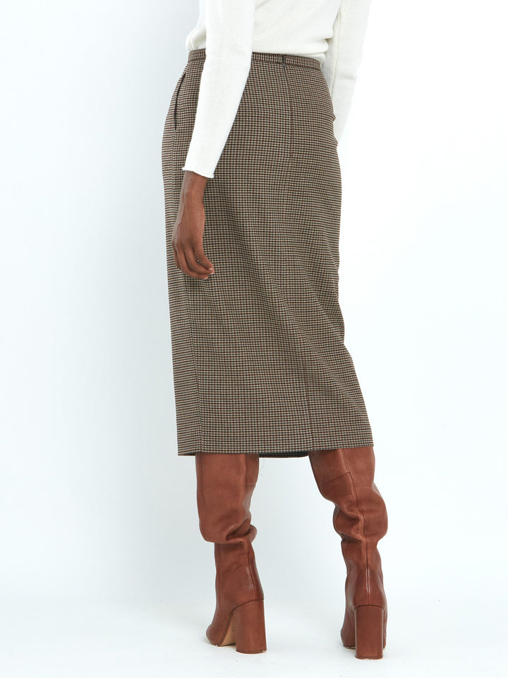 A faux wrap, mid calf length pencil skirt in a soft handle micro check. Sophisticated city style with a hint of heritage. 