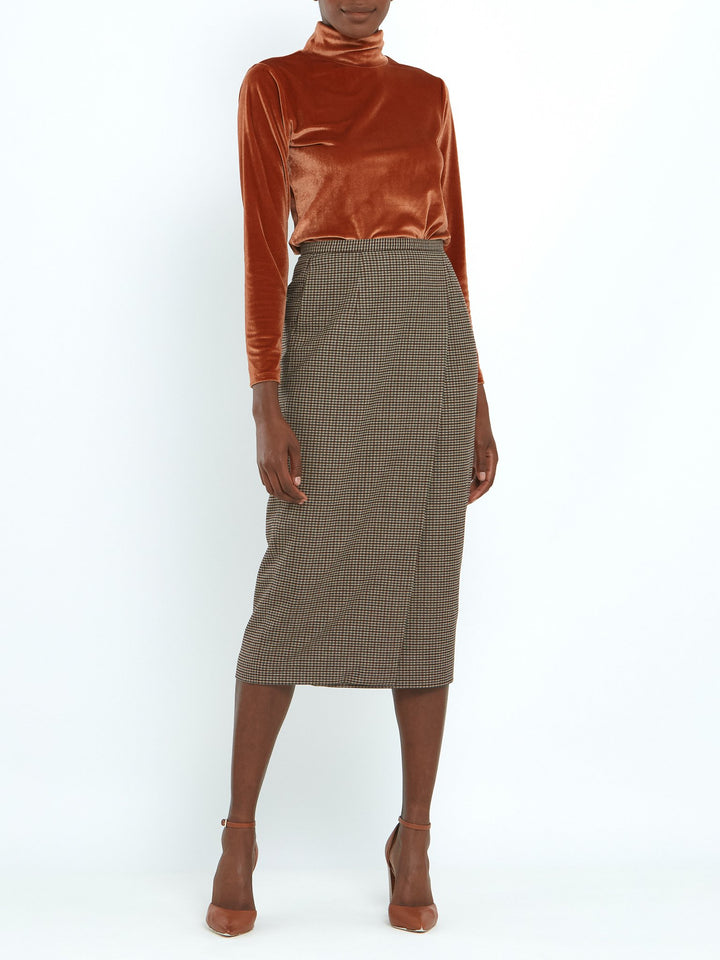 A faux wrap, mid calf length pencil skirt in a soft handle micro check. Sophisticated city style with a hint of heritage. 
