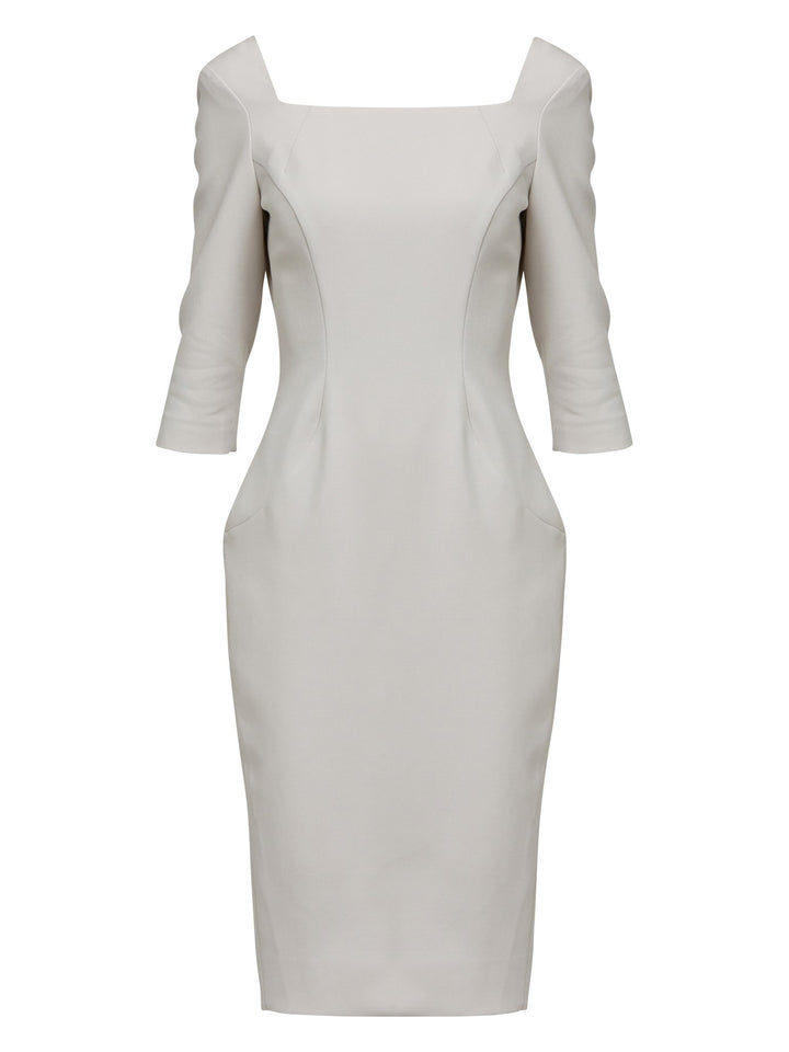 Introducing Mia, a body-skimming dress in a sophisticated latte. The dress features a flattering square neck and falls to a demure finish below the knee. Simple and refined elegance at its best. Attending a summer wedding? Mother of the bride? Heading to the races? This is the dress for you.