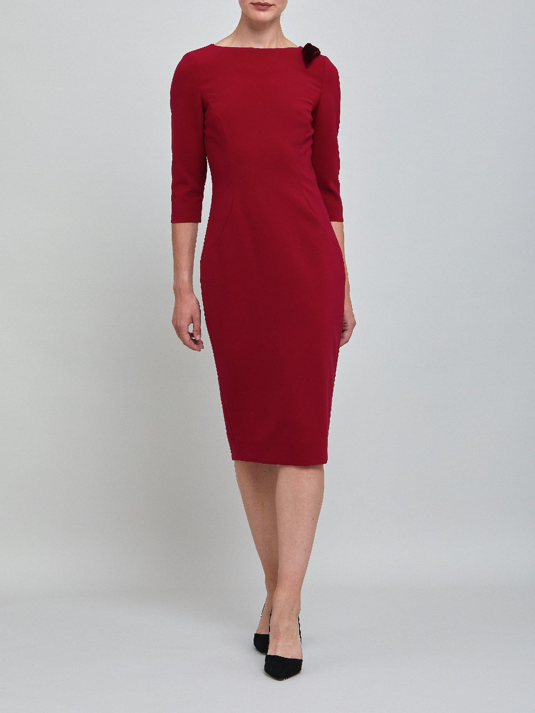 Natara, the perfect occasion dress. Crafted in a tricotine fabric with a hint of stretch. A body-skimming silhouette with slash neck, velvet bow detail and a pencil skirt the dress falls to mid-calf. Wear her out to cocktails with the girls, date night or a special winter wedding!