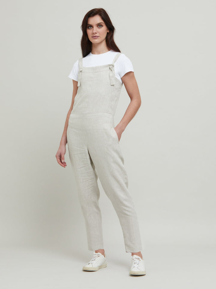 Introducing the Oakley Overalls. Sunny summer day & holiday lunches...this one-piece has you covered. A must-have pull-on linen jumpsuit in a fresh oatmeal tone. Style with our iconic white timeless tops for a fresh and easy look.