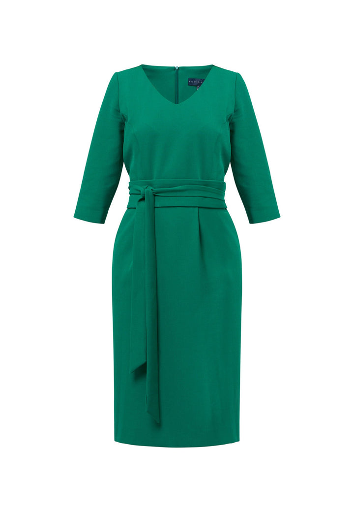 Introducing the Ophelia Dark Emerald Green Dress, a timeless and impeccably tailored silhouette. This expertly crafted dress features a form-flattering design with convenient pockets, a detachable belt, and a pencil skirt that falls to a chic mid-calf length. The sophisticated V-neckline adds an elegant touch to the overall look. Crafted from sustainably sourced fibers with a hint of stretch, this dress ensures both comfort and ease of movement. 