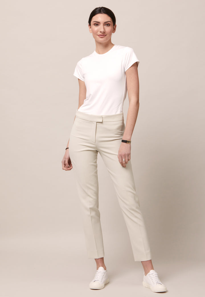 Investment-worthy, neat narrow-leg trouser with a hint of stretch. A wardrobe staple and HMcA classic. This fabric is made with a hint of elastane to ensure comfort and ease of movement. Shown here in a sophisticated ivory tone. Pair with a simple tee for workwear appeal or elevate your look with the coordinating blazer.