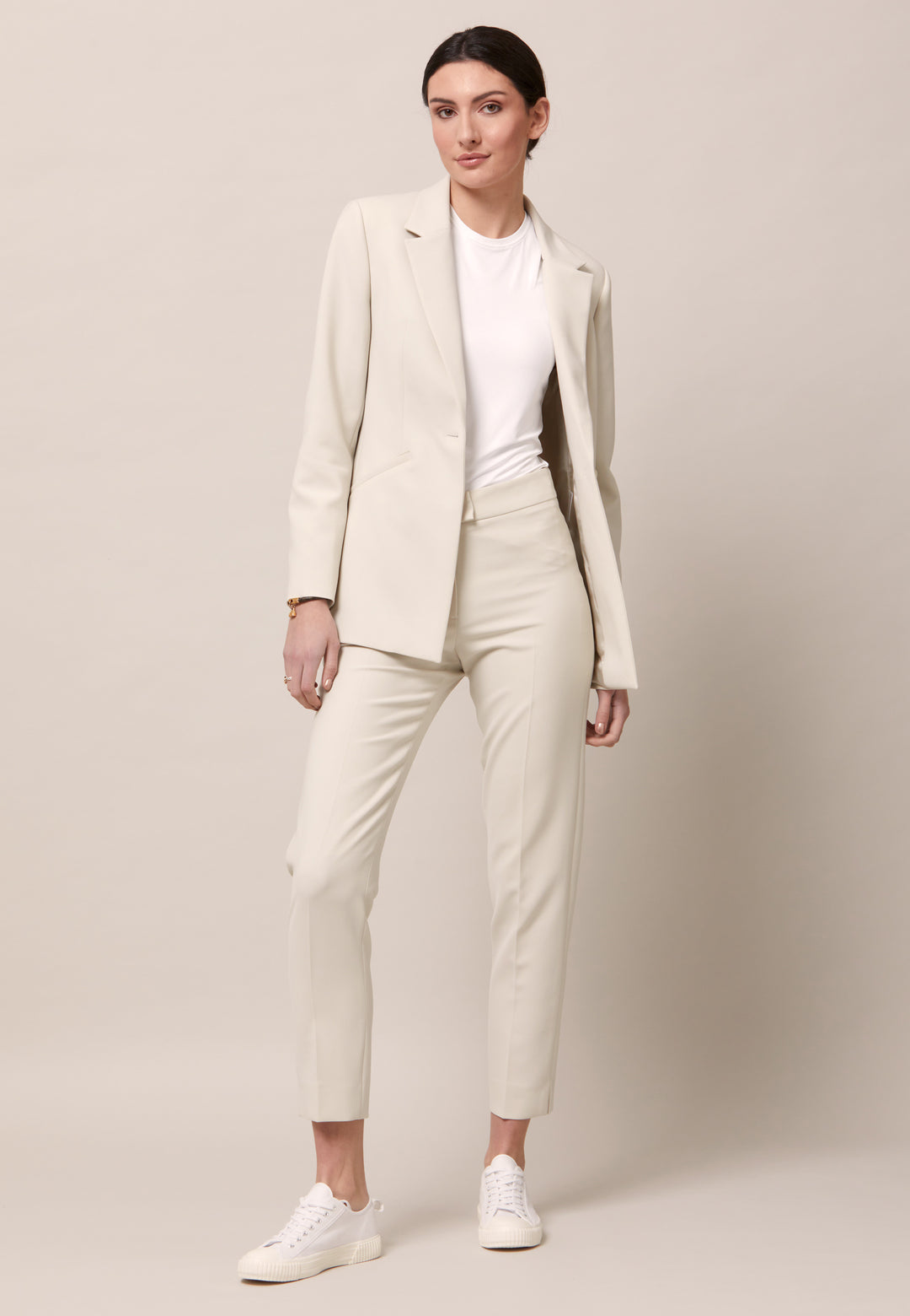 Investment-worthy, neat narrow-leg trouser with a hint of stretch. A wardrobe staple and HMcA classic. This fabric is made with a hint of elastane to ensure comfort and ease of movement. Shown here in a sophisticated ivory tone. Pair with a simple tee for workwear appeal or elevate your look with the coordinating blazer.