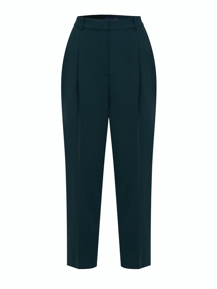 Investment-worthy, neat narrow-leg woolen trousers with a hint of stretch. A wardrobe staple and HMcA classic. This signature fabric is made from sustainability sourced fibers with a hint of elastane to ensure comfort and ease of movement.