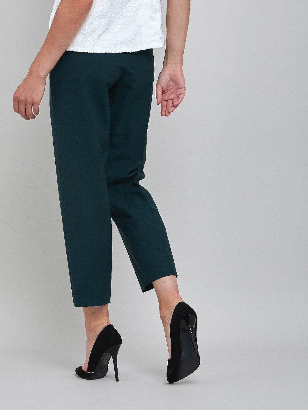 Investment-worthy, neat narrow-leg woolen trousers with a hint of stretch. A wardrobe staple and HMcA classic. This signature fabric is made from sustainability sourced fibers with a hint of elastane to ensure comfort and ease of movement.