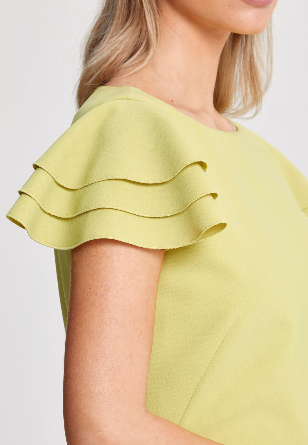 Turn Heads at your upcoming occasions In this striking citrus shift dress. Engineered with a flirty tripple tiered frill cap sleeve. Heighten the drama of this piece with your favourite accessories and heels. Attending a summer wedding? Mother of the bride? Heading to the races? This is the dress for you.