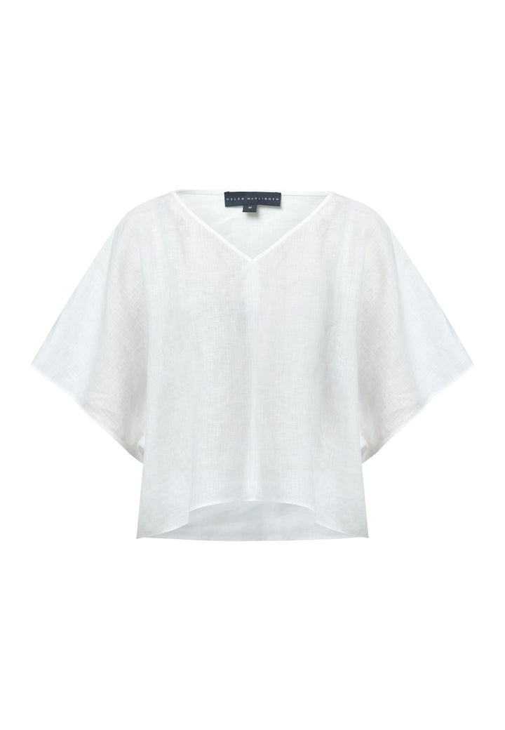 Quinn White Linen Shirt offers an effortless warm-weather look, crafted from breathable pure linen with a flattering v-neck design. Its easy fit ensures summer comfort, complemented by subtle pleat detailing on the back hem for added style.