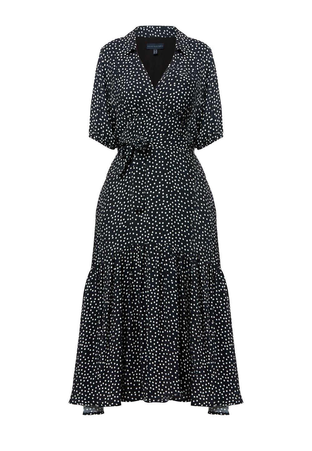 Raquel channels 30's glamour with its classic navy and white polka dot design in our favored viscose crepe. This dress boasts a flattering fit-and-flare skirt and a cross-over V-neckline. A soft belt cinches the waist, offering a customizable look that enhances the figure—whether tied at the front or back, the belt provides styling versatility. Elbow-length sleeves complete the 30's-inspired silhouette, making it a versatile wardrobe essential.