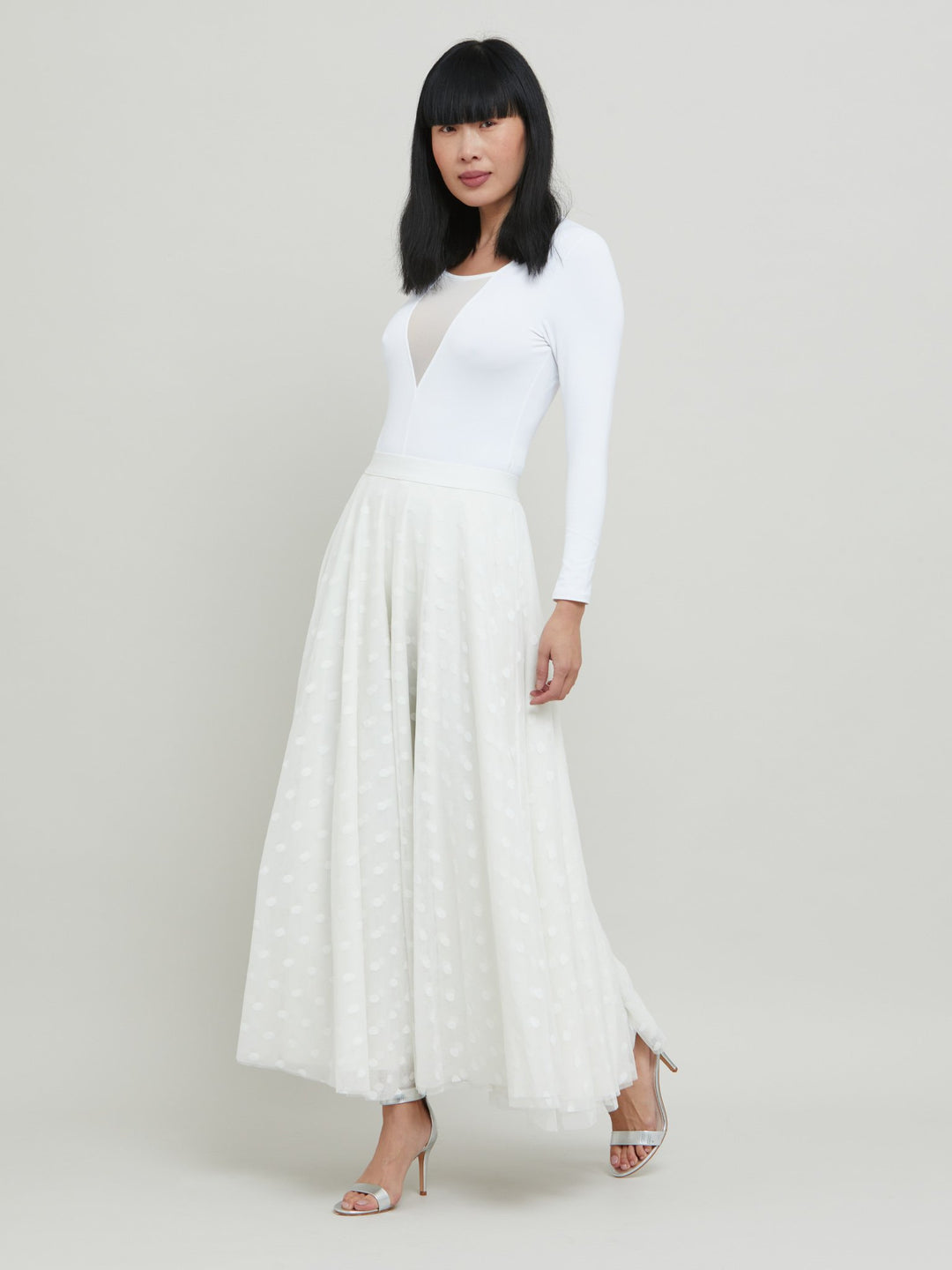 Savannah, this season multi-layer, circular skirt in a luxe polka dot tulle. Features an elasticated waistband and falls to the ankle. For the perfect occasion & wedding look pair with the iconic white Darcie jacket & the Brooklyn body. Designed in Ireland by Helen McAlinden. Made in Europe. Free shipping to the EU & UK.