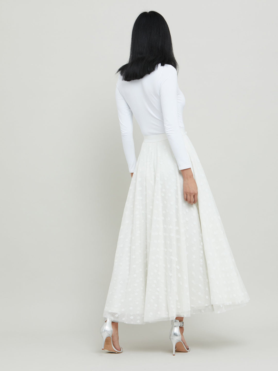 Savannah, this season multi-layer, circular skirt in a luxe polka dot tulle. Features an elasticated waistband and falls to the ankle. For the perfect occasion & wedding look pair with the iconic white Darcie jacket & the Brooklyn body. Designed in Ireland by Helen McAlinden. Made in Europe. Free shipping to the EU & UK.