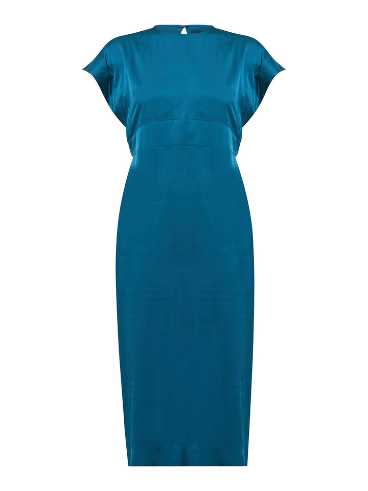 Introducing the Shiv dress, a stunning redefinition of occasion wear that is sure to make a statement. Crafted from luxurious petrol blue satin viscose, this dress exudes opulence. The easy-fitting silhouette gracefully falls to the mid-calf, creating an elegant and flattering look. With its side slit and convenient pockets, it combines style and functionality. The dress is further enhanced by an exquisite key-hole back neck detail, adding a touch of sophistication.