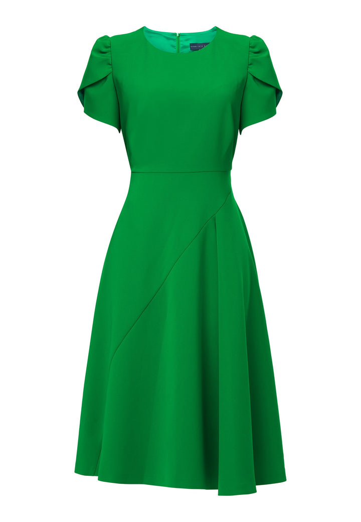 Introducing the Vera Kelly Green Dress, a captivating fit and flare ensemble that effortlessly combines timeless elegance with modern charm. This dress boasts an A-line skirt that creates a graceful and feminine silhouette, while its detailed overlap short sleeves add a unique and stylish touch to the design. With its form-flattering fit, this dress accentuates your curves in all the right places, making it perfect for weddings and other special occasions. 
