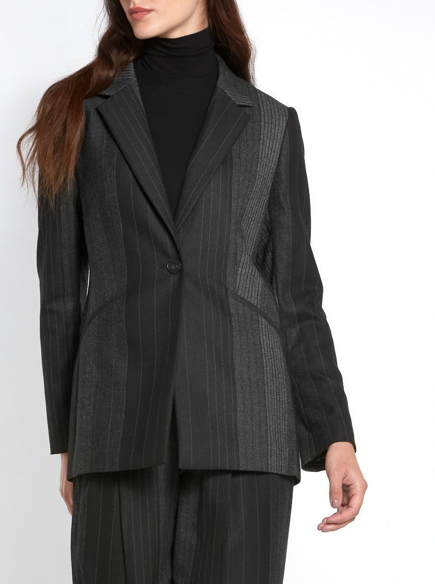 Think Diane Keaton in Manhattan. An elegant jacket fabricated in an androgynous random monotone stripe. A Classic Semi-Fitted silhouette with lapel collar, jeet pockets, lined & tailored with a one-button fastening. Helen proses to style with the co-ordinating Sophie pant & Cora polo-neck top.